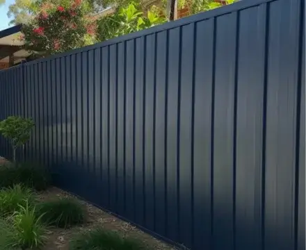 newly installed blue Colorbond fence in Melton
